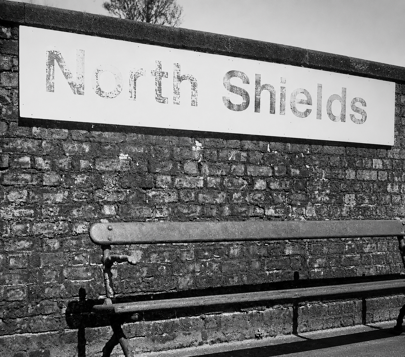 North Shields station sign in black and white
